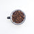 B・SYNC ON - Caffeine - Coffee beans in a mug